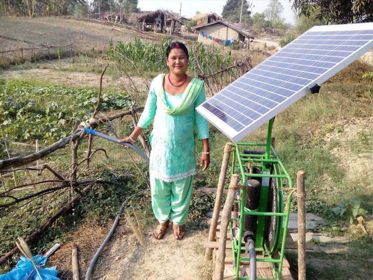 Nepal farmers in fields with solar irrigation pump2 Futurepump